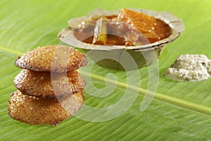 South Indian fast food fried idly with coconut chutney.