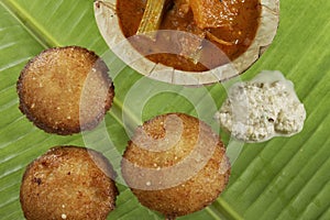 South Indian fast food fried idly with coconut chutney.