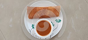 South Indian food masala dosa in ceramic plate