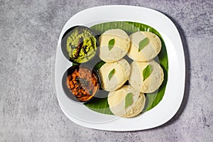 South Indian foods Idli, Medu Vada,dosa with Sambar,coconut chatney and tomato chatney.