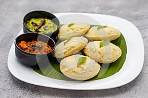 South Indian foods Idli, Medu Vada,dosa with Sambar,coconut chatney and tomato chatney.