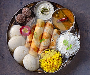 South Indian gluten free vegetarian platter in steel plate