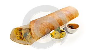 South Indian Masala Dhosa or dosa served with sambhar, coconut chutney, red chutney and green chutney, South Indian Breakfast