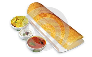 South Indian Masala Dhosa or dosa served with sambhar, coconut chutney, red chutney and green chutney, South Indian Breakfast