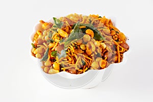South indian spicy crunchy mix Nimco or Namkeen white bowl background isolated