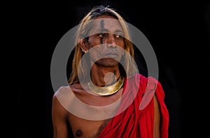 South Indian Tamil man in traditional red toga