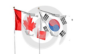 South Korea flag and Canada flag. waving in the blue sky