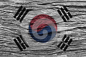 South korea flag with high detail of old wooden background .