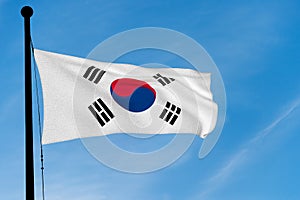 South Korea Flag waving over blue sky