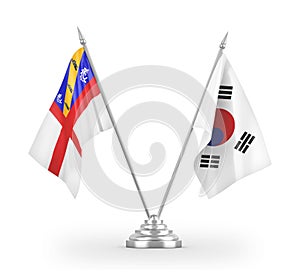 South Korea and Herm table flags isolated on white 3D rendering