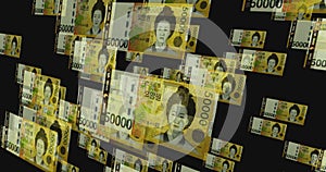 South Korea Won 50000 banknote â€“ flying between transparent money