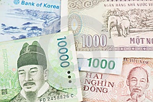 South Korea Won and Vietnamese Dong banknotes. Asia Money Currency photo