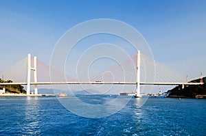 Yeosu harbor with Geobukseon or Dolsan-ro 2 bridge, South Korea photo