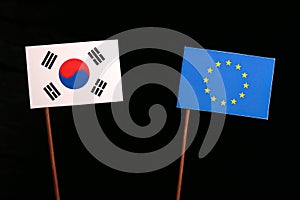 South Korean flag with European Union EU flag isolated on black