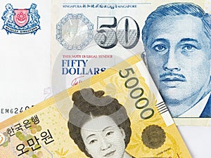 50000 South Korean won and 50 Singapore dollar