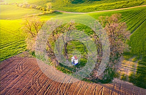 South Moravia landscape with chapel of Saint Barbara from above during spring evening sun light, Moravian Tuscany region