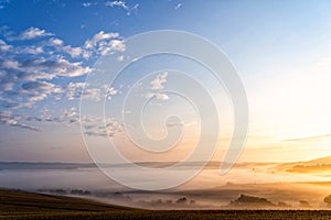 South moravian landscape with low clouds during a sunrise.