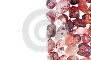 South onyx heap stones texture on half white light isolated background. Place for text