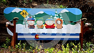 South Park cartoon themed bench made of snow boards.