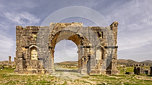 South side of the Arch of Caracalla at the Archaeological Site of Volubilis in Morocco.