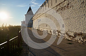 South stone defensive wall and South-eastern round tower of Tobolsk Kremlin. Tobolsk. Russia