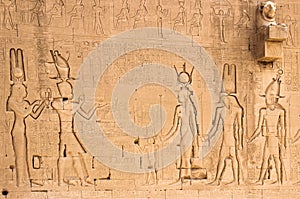 South wall of the temple of Hathor at Dendera with lion-headed waterspouts