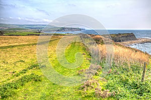 South west coast path Kimmeridge Bay east of Lulworth Cove and near Kimmeridge village on the Dorset coast England uk