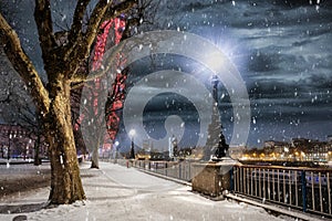 The Southbank in London, UK, with falling snow in winter photo