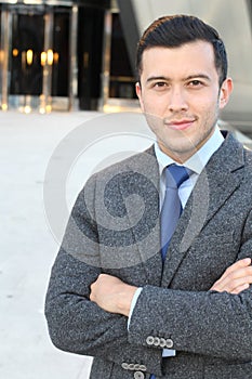 Southeast Asian businessman with arms crossed