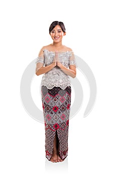 Southeast Asian ethnic female outfit full body shot on white background