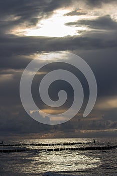 Souther Baltic sea coast, Northern Poland, Pomerania, sandy beach, dramatic sky, late winter time