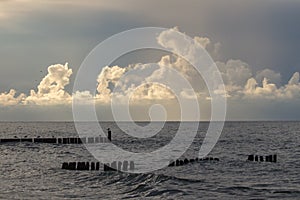 Souther Baltic sea coast, Northern Poland, Pomerania, sandy beach, dramatic sky, late winter time