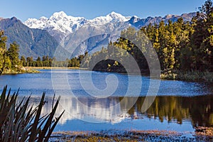 Southern Alps. Matheson lake - Mirror Lake. Mount Cook and mount Tasman. South Island. New Zealand