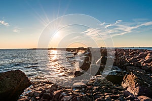 Southern breakwater in Liepaja, Latvia by the Baltic sea during sunny summer day. View of the sea, seascape