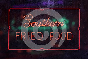 Southern Fried Food Neon Sign in Rainy Window