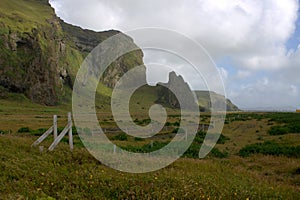 Southern Iceland scenery with volcanic formations by the oceanside