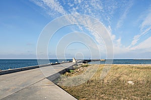 Southern long concrete pier with breakwaters on the Baltic Sea on the Vistula Spit. Baltiysk. Russia