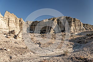 Southern Oregon desert with dry creek and peaks