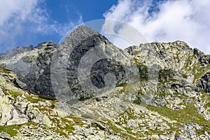 The southern wall of the peak Wolowa Turnia Volia veza with climbing routes in the High Tatras in Slovakia