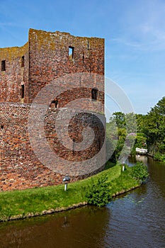 Southside with the moat of the ruin castle Teylingen in Sassenheim