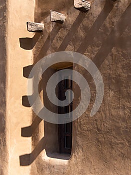 Southwestern architecture, window in adobe wall