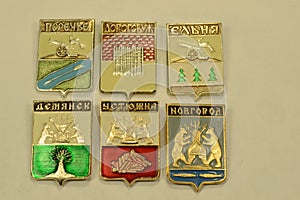 Souvenir badges of coats of arms of Russian cities