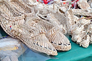Souvenir bast shoes woven from bast