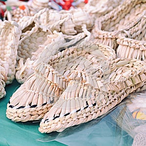 Souvenir bast shoes woven from bast