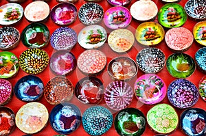 Souvenir colourfully lacquer bowls on the market in Luang Prabang, Laos photo
