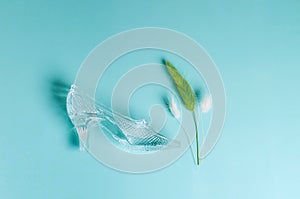 Souvenir crystal shoe and dried lagurus flower