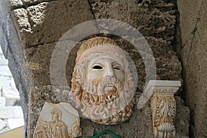 Souvenir depicting a Greek mask