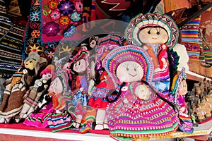 Souvenir dolls in bolivian national cloth photo