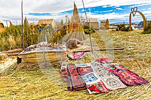 Souvenir on Floating islands Titicaca lake, Peru,South America. Street shop with colorful blanket, scarf, cloth