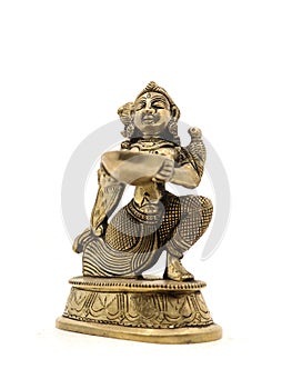 a souvenir gold statue of a goddess holding and offering a bowl of holy water